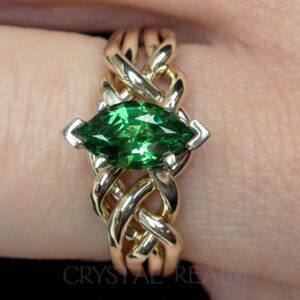 marquise green garnet on medium-heavy 14k yellow gold four piece puzzle ring