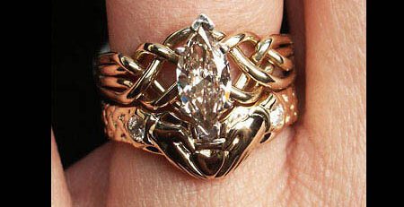 Marquise diamond puzzle ring with diamond claddagh shadow band