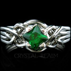 Avalon puzzle engagement ring with princess cut tsavorite green garnet and palladium