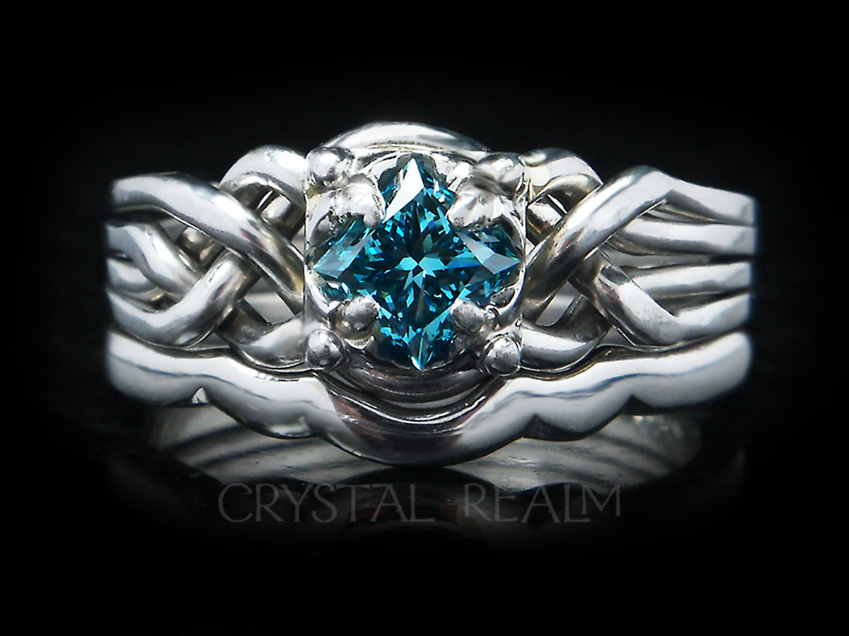 One-half carat blue diamond four band puzzle ring in Guinevere style mated with a 1.7mm shadow band