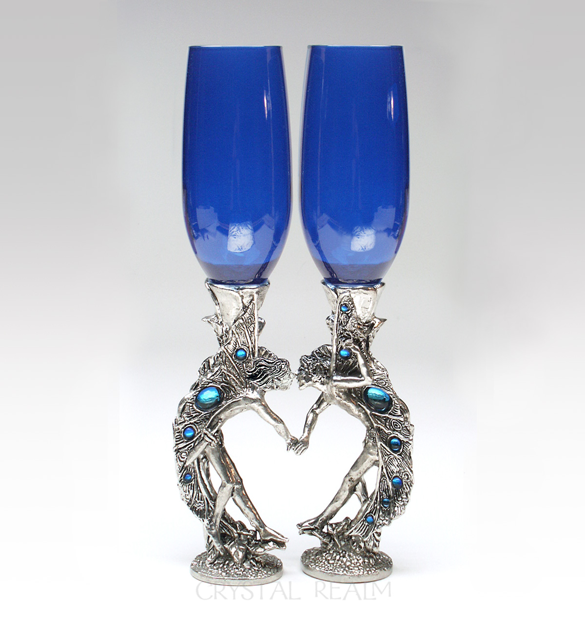 Girl-boy blue champagne glasses with fairies in a heart shape