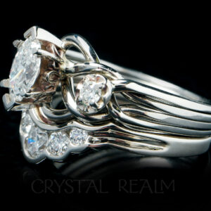Marquise royale puzzle ring with 0.50CT tcw and a 0.32CT diamond shadow band