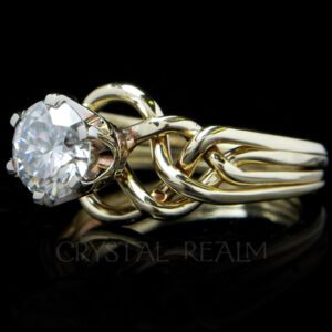 puzzle engagement ring with two carat round brilliant moissanite