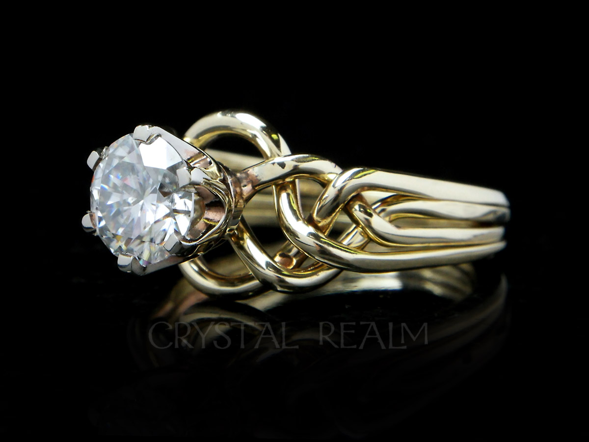 puzzle engagement ring with two carat round brilliant moissanite