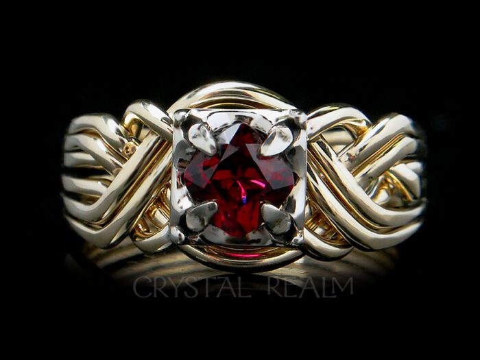 6 piece puzzle ring with cushion cut anthill garnet and 14k yellow and white gold