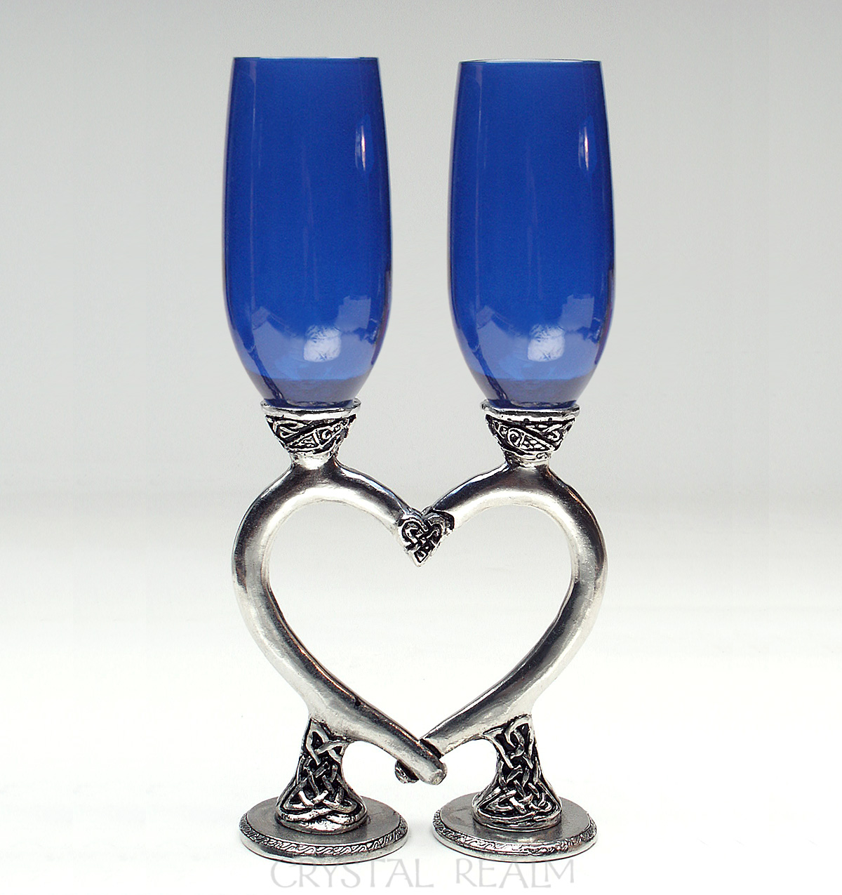Royal blue champagne flutes with Celtic bases