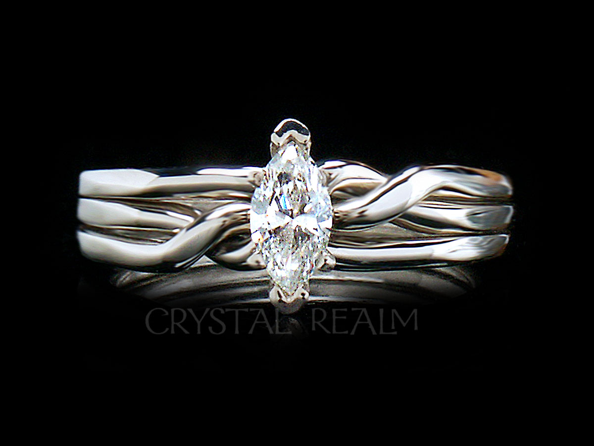 3 piece puzzle ring with marquise diamond