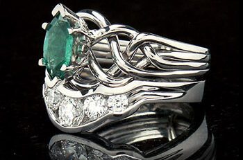 four band puzzle ring with marquise emerald and five diamond wedding ring