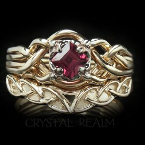 Rhodolite garnet Guinevere puzzle engagement ring in 14K yellow gold with Celtic knotwork shadow wedding band